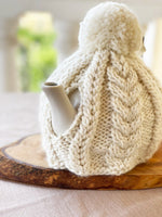 Cable knit teapot cozy spout view