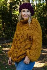 Chunky turtleneck sweater with cable design