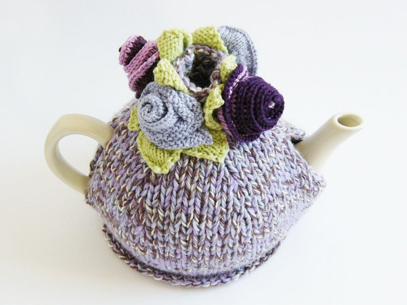 tea cosy with knitted flowers