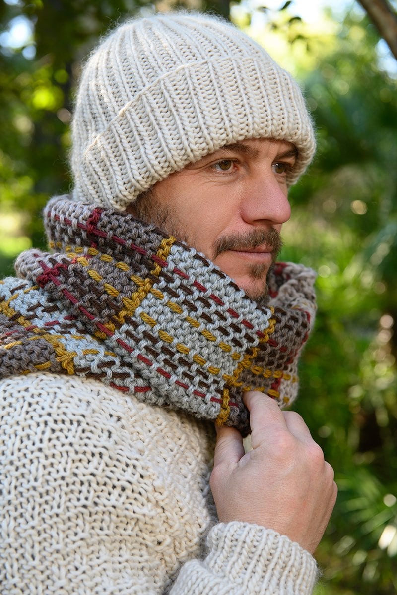 Knitted ribbed beanie hat and tartan scarf