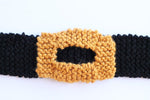knitted belt buckle on belt