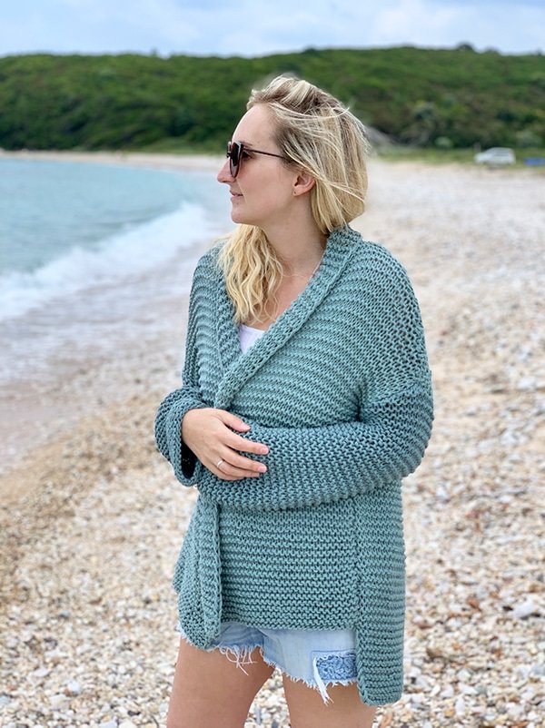 woman wearing a loose fitting knitted cardigan
