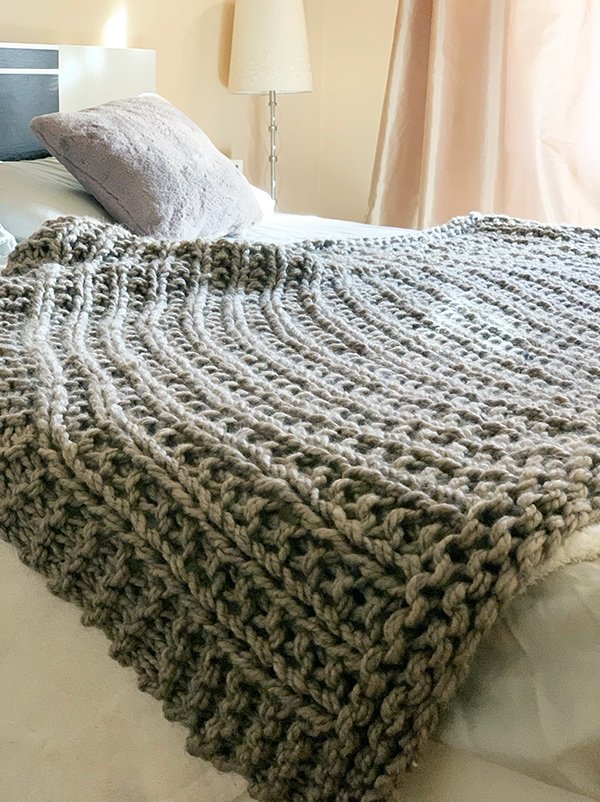 chunky blanket on bed