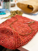 crochet crossbody bag on desk