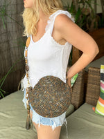 woman wearing a crochet circle bag