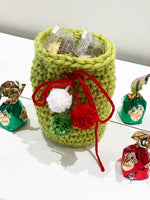crochet drawstring bag in green yarn