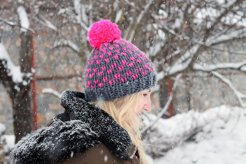 pink and grey knitted beanie hat