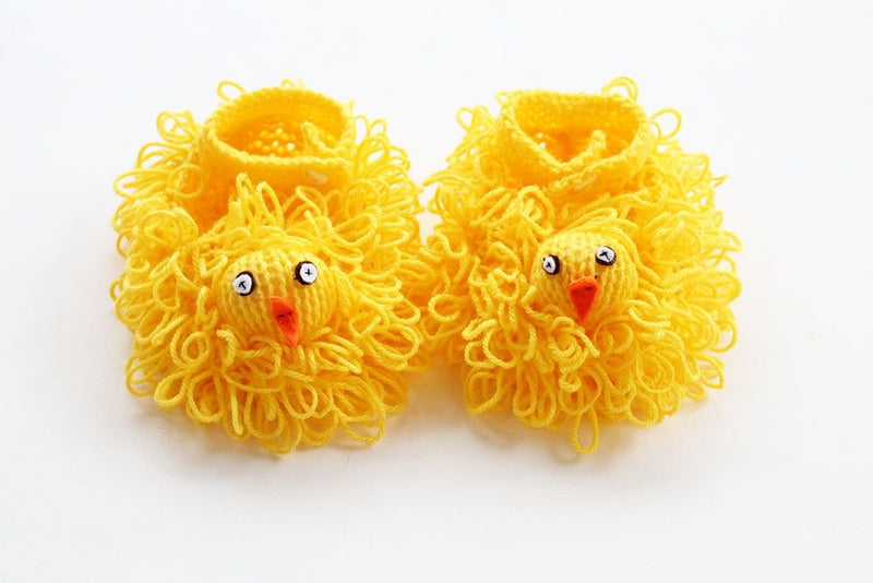 Easter chick slippers knitted in yellow yarn
